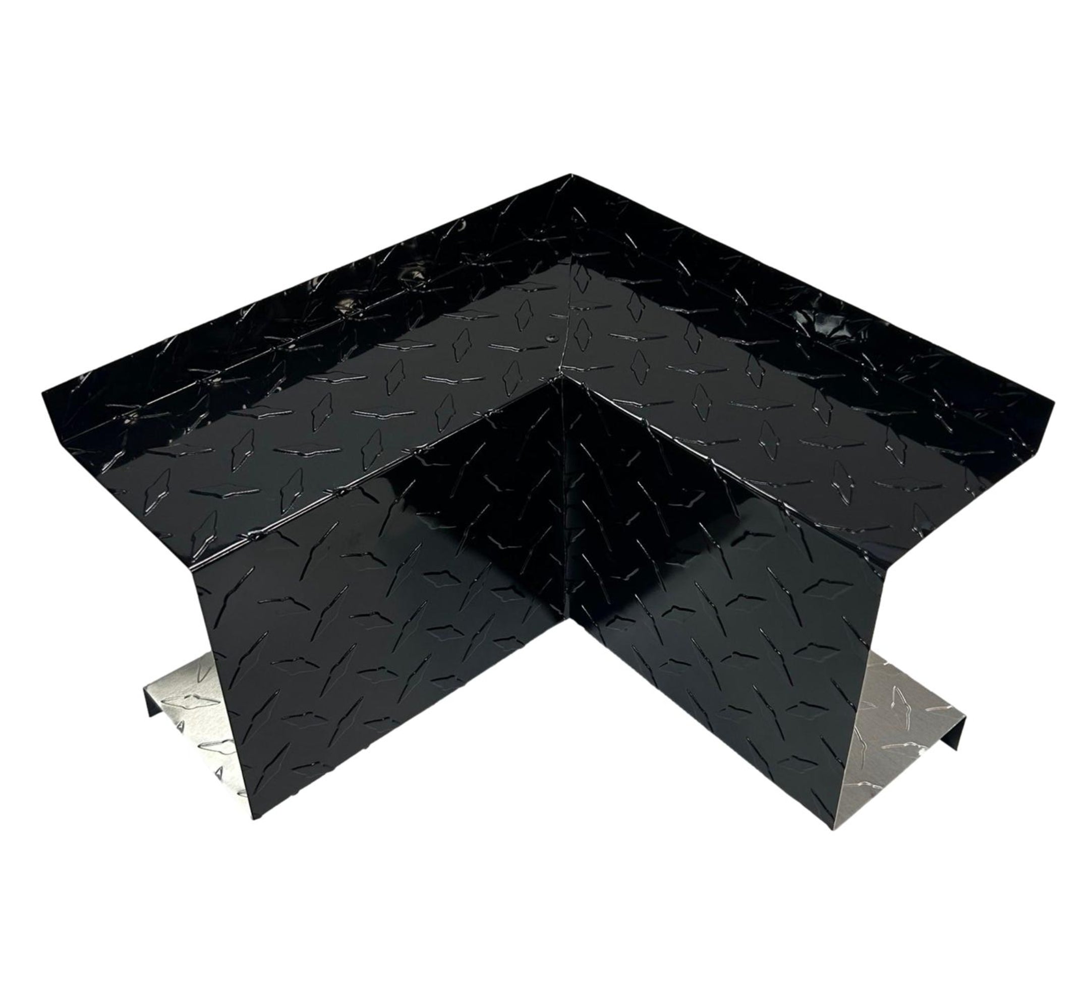 A PermaCover Metal HVAC Line Set Cover Inside Corner Elbow that is made to attach to exterior walls to cover existing HVAC line sets. The elbow cover made from 0.025 inch Aluminum Diamond Tread Plate in color Black.