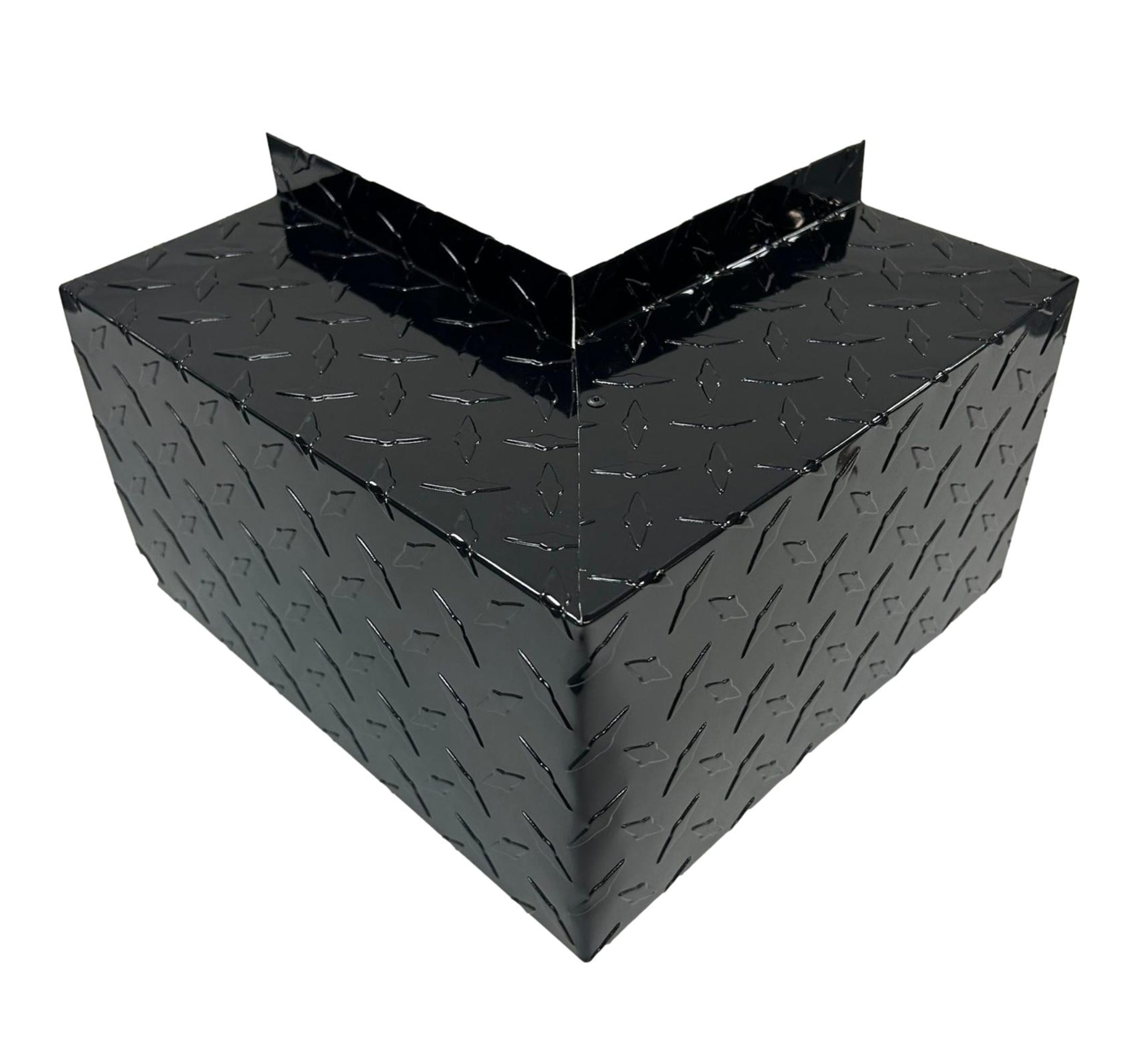 A PermaCover Metal HVAC Line Set Cover Outside Corner Elbow that is made to attach to exterior walls to cover existing HVAC line sets. The elbow cover made from 0.025 inch Aluminum Diamond Tread Plate in the color Black.