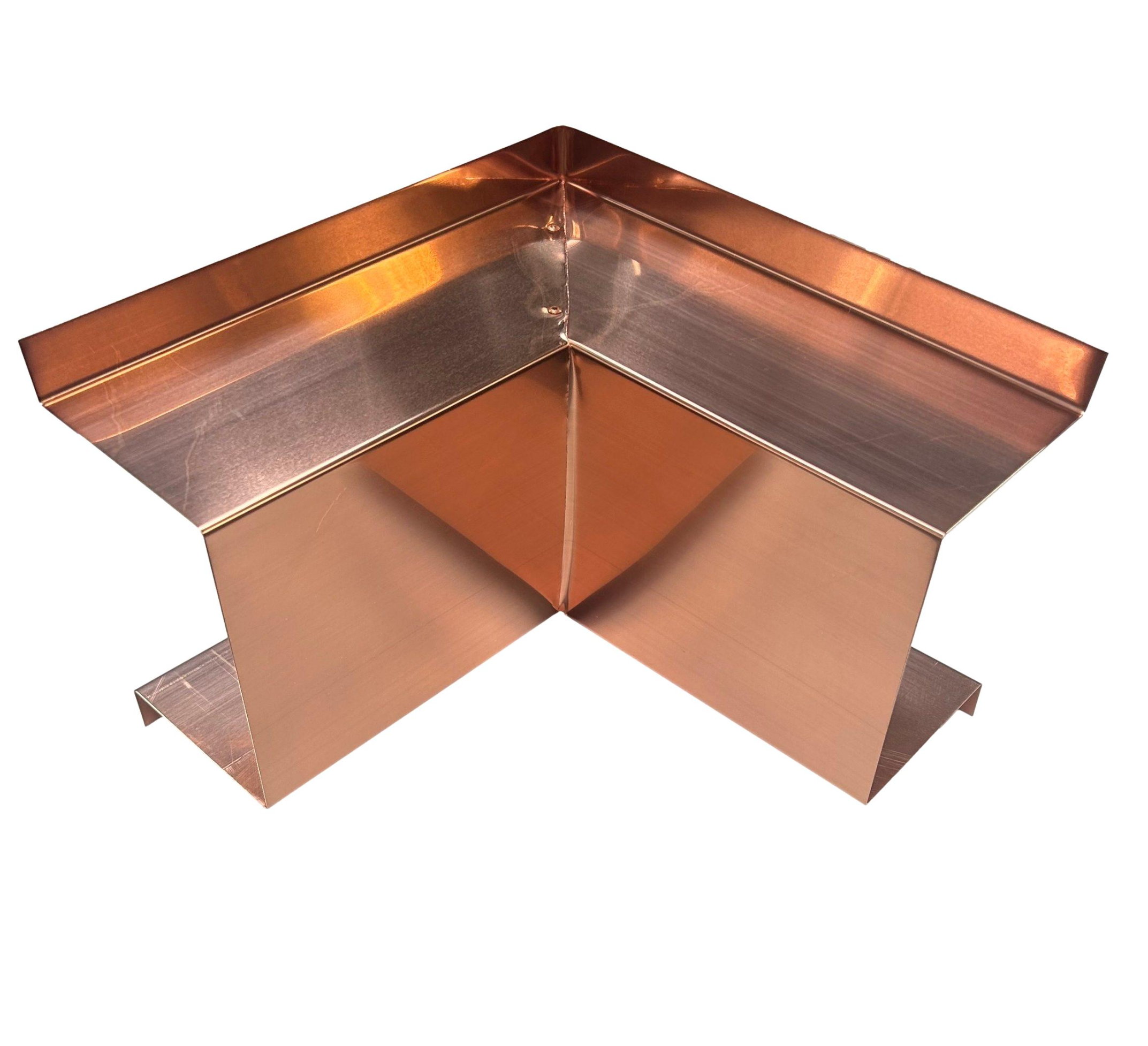 A PermaCover Metal HVAC Line Set Cover Inside Corner Elbow that is made to attach to exterior walls to cover existing HVAC line sets. The elbow cover is made from 20 ounce copper metal.