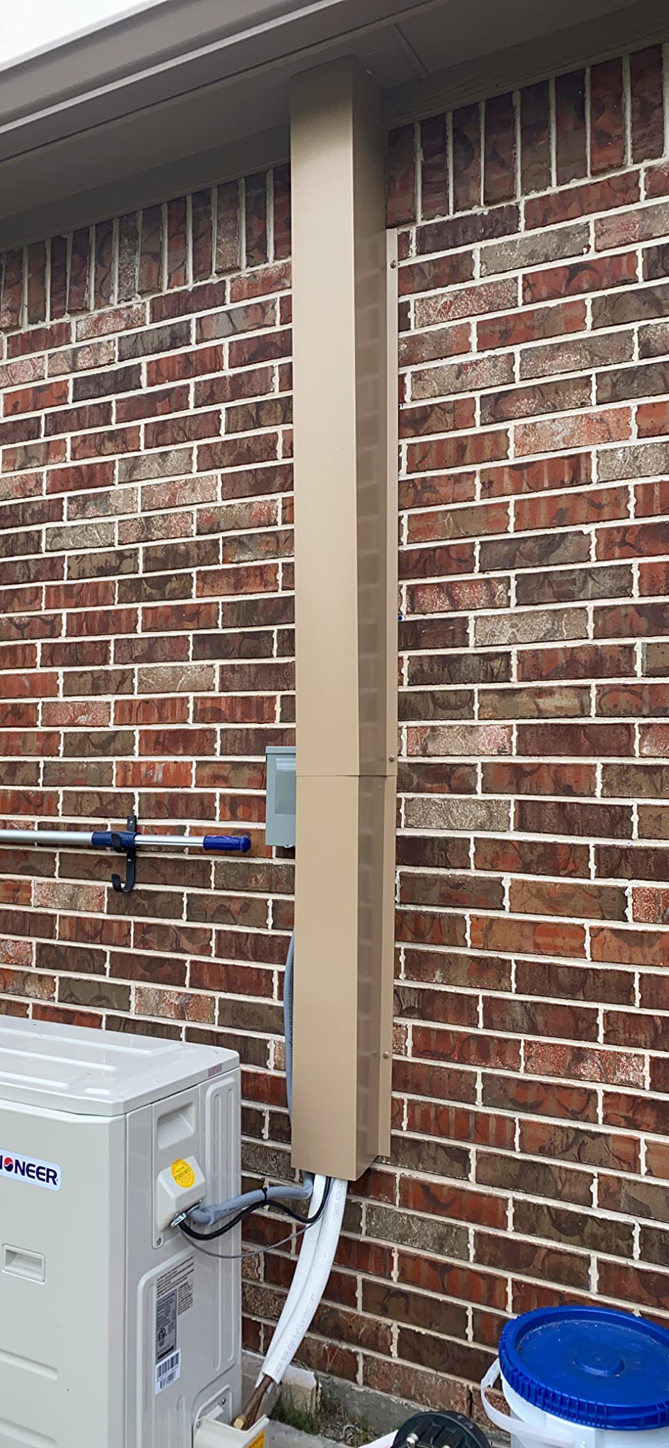 Line Set Cover installed on HVAC unit.