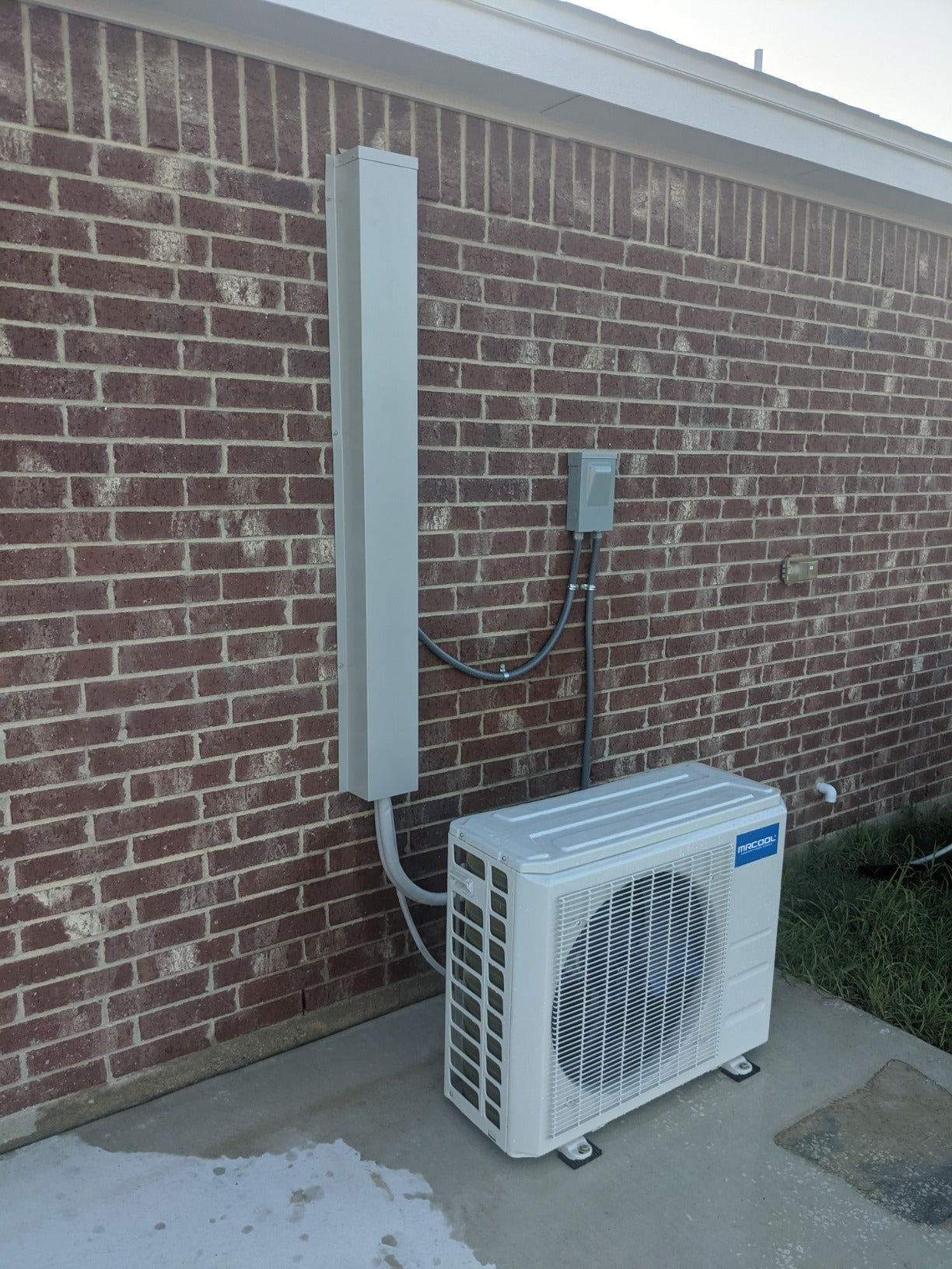 Line Set Cover installed on HVAC unit.