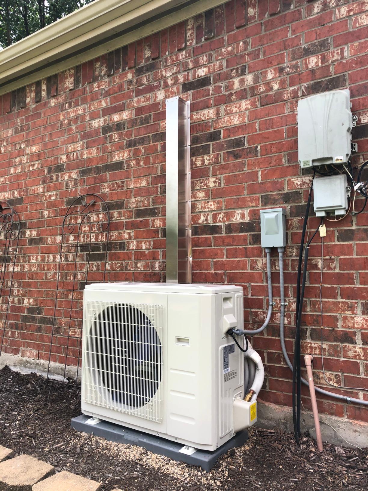 Line Set Cover installed on HVAC unit.