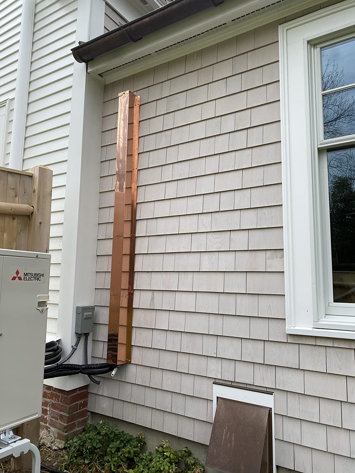 Line Set Cover installed on HVAC unit.