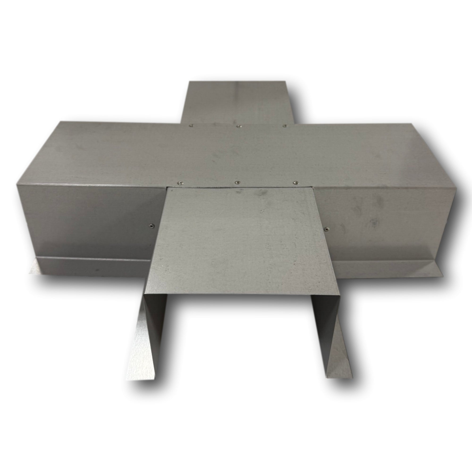 A PermaCover Metal HVAC Line Set Cover 4-Way T-Joint Connector that is made to attach to exterior walls to cover existing HVAC line sets. The elbow cover is made from 26 Gauge Paintable Steel.