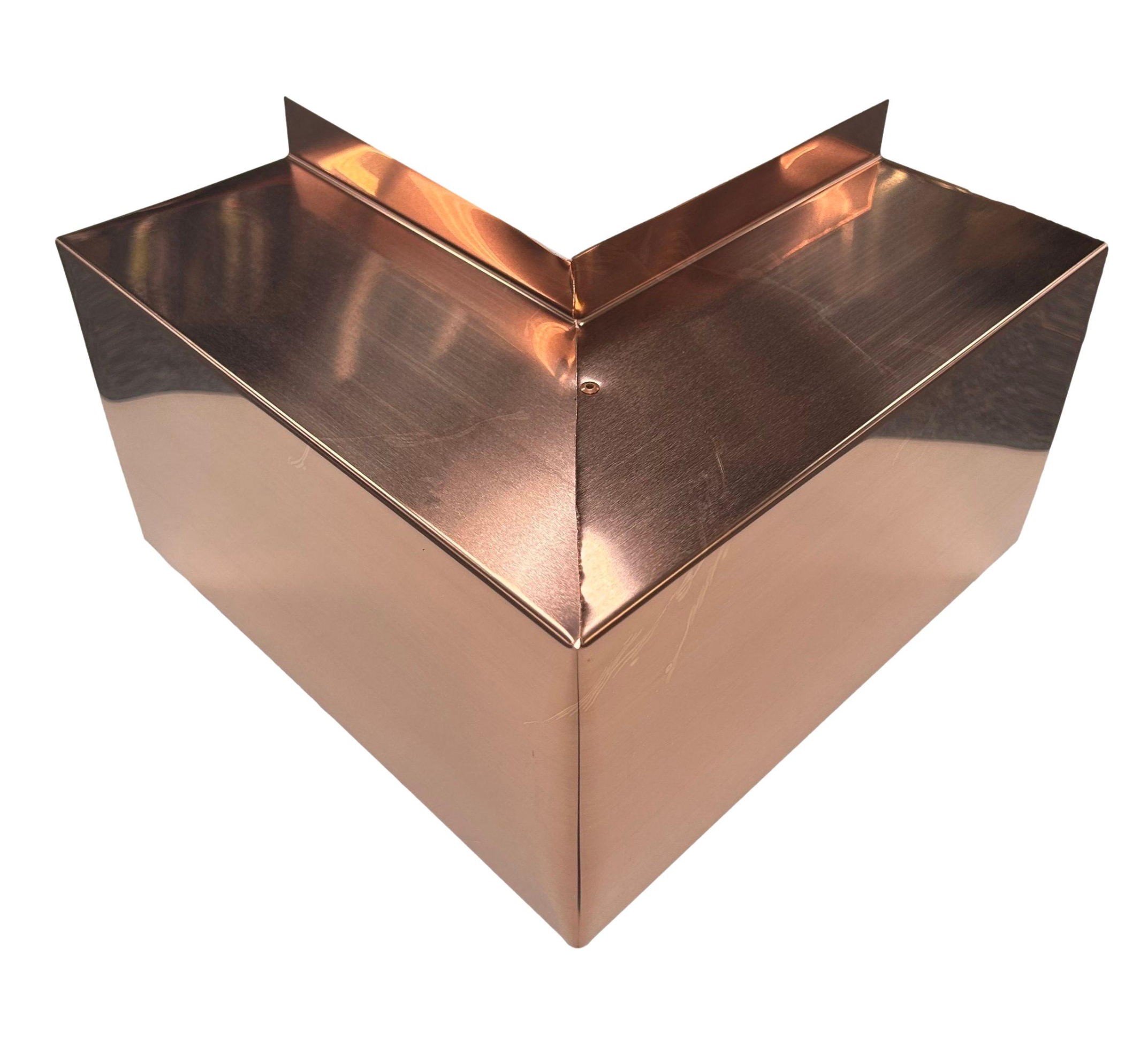 A PermaCover Metal HVAC Line Set Cover Outside Corner Elbow that is made to attach to exterior walls to cover existing HVAC line sets. The elbow cover is made from 20 ounce copper metal. 